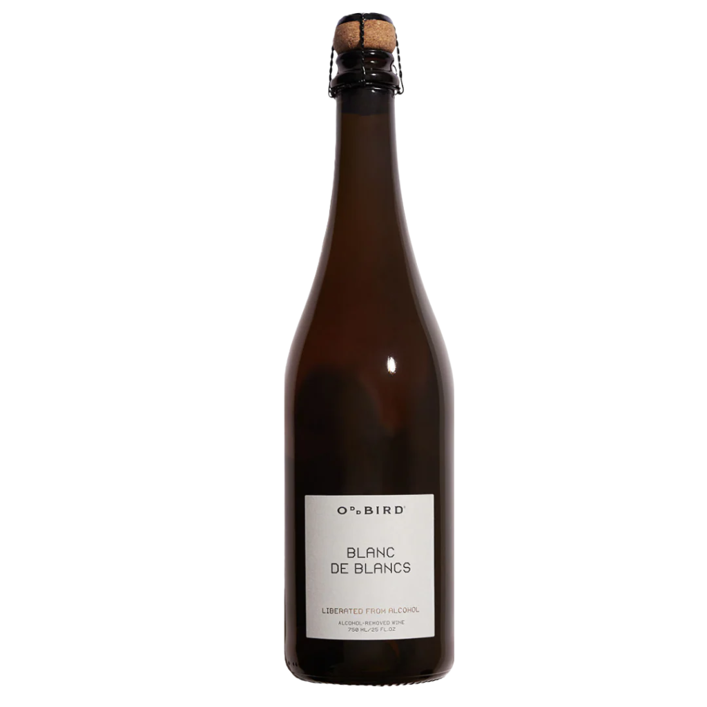 A dark glass bottle of Oddbird Sparkling Blanc de Blanc NV non-alcoholic sparkling wine with a cork and a white label on the front.