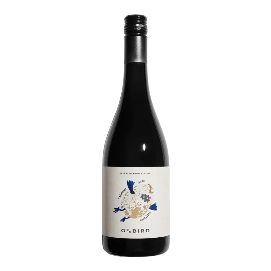 A dark wine bottle labeled "Oddbird GSM Rouge NV" with a white label featuring blue bird and gear illustrations.