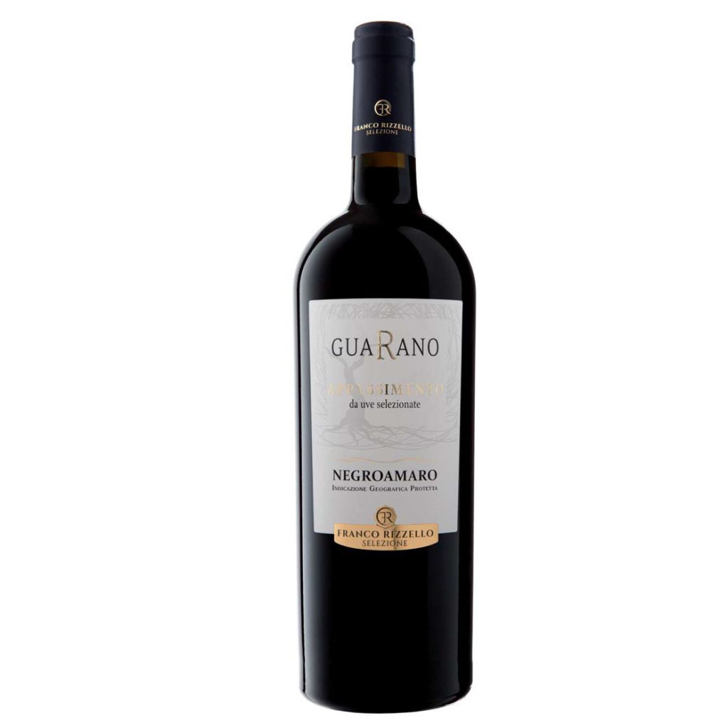 A bottle of Le Vigne di Sammarco GUARANO Negroamaro Appassimento Salento IGP 2021 with a black cap and white label stands upright against a white background.